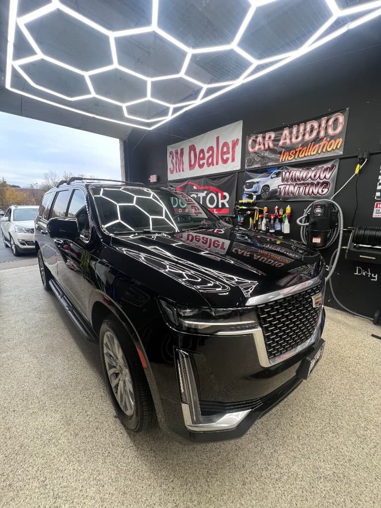 Black Cadillac Escalade complete detail at Doctor Detail shop — Eagan MN