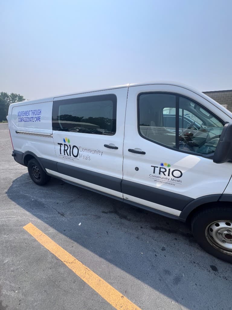 Custom vinyl graphics and signs on commercial van — Doctor Detail Eagan MN