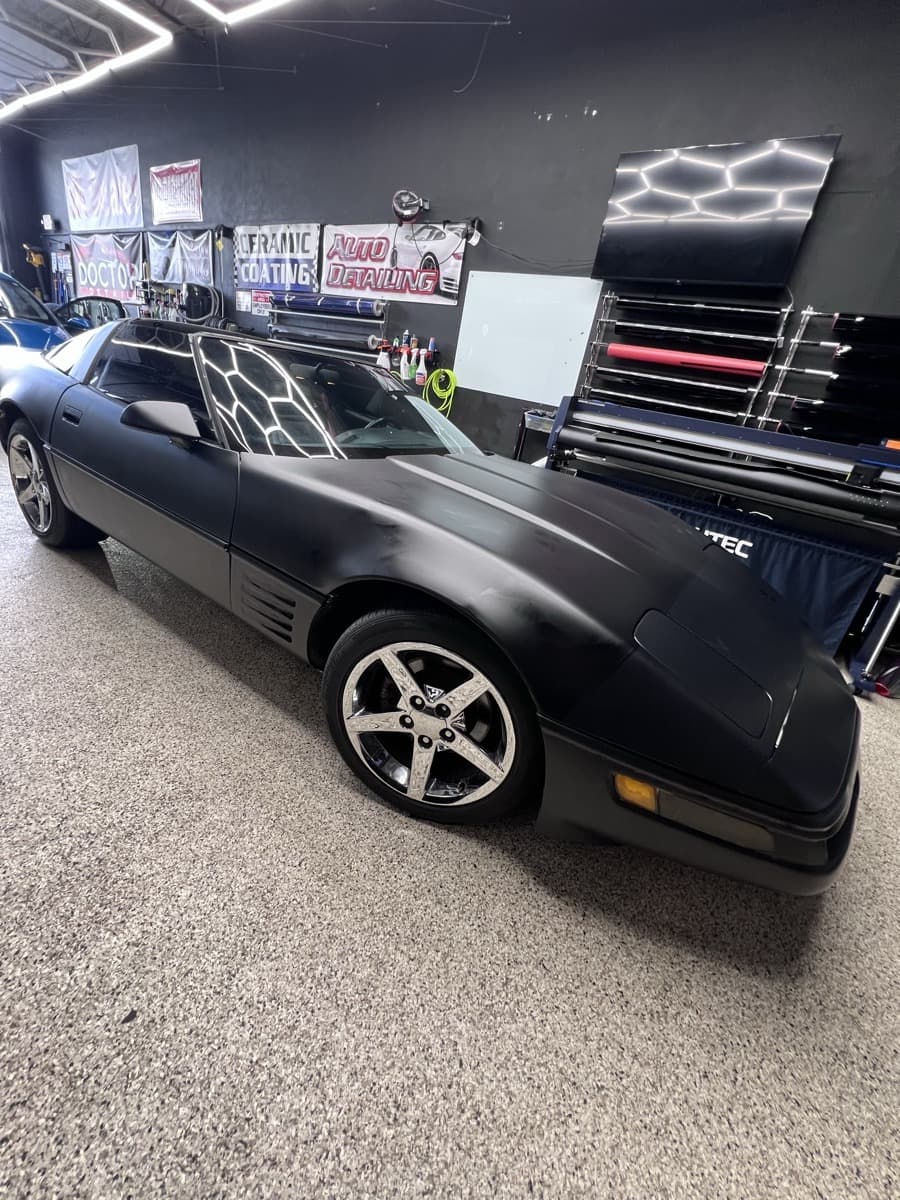 Black Corvette matte black Avery Dennison wrap — Doctor Detail Eagan MN