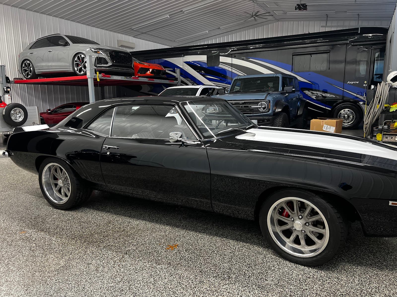 Classic muscle cars and RV in Doctor Detail shop — Eagan MN