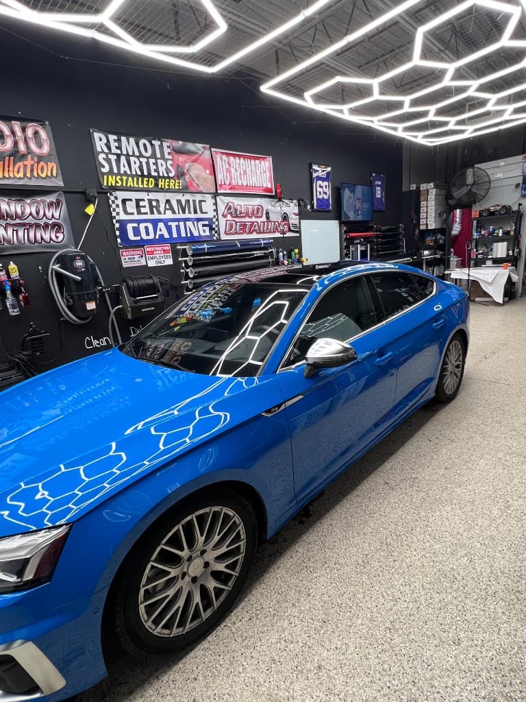 Blue Audi window tint at Doctor Detail shop — Eagan MN