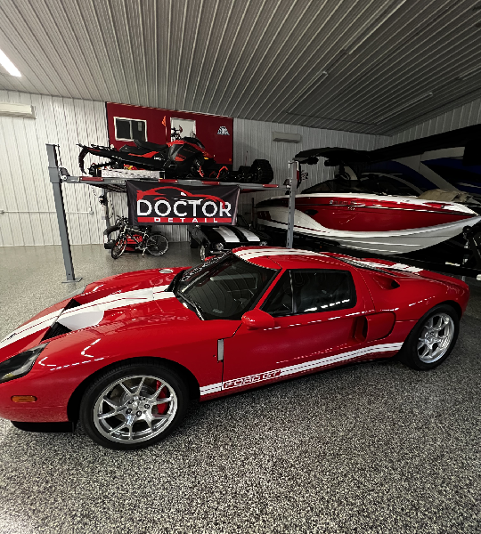 A closeup look at a car in red color